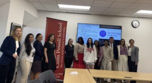 Eisenhower Fellows pose with Powell School students