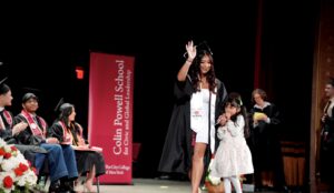 Powell School graduate walks across the stage at graduation