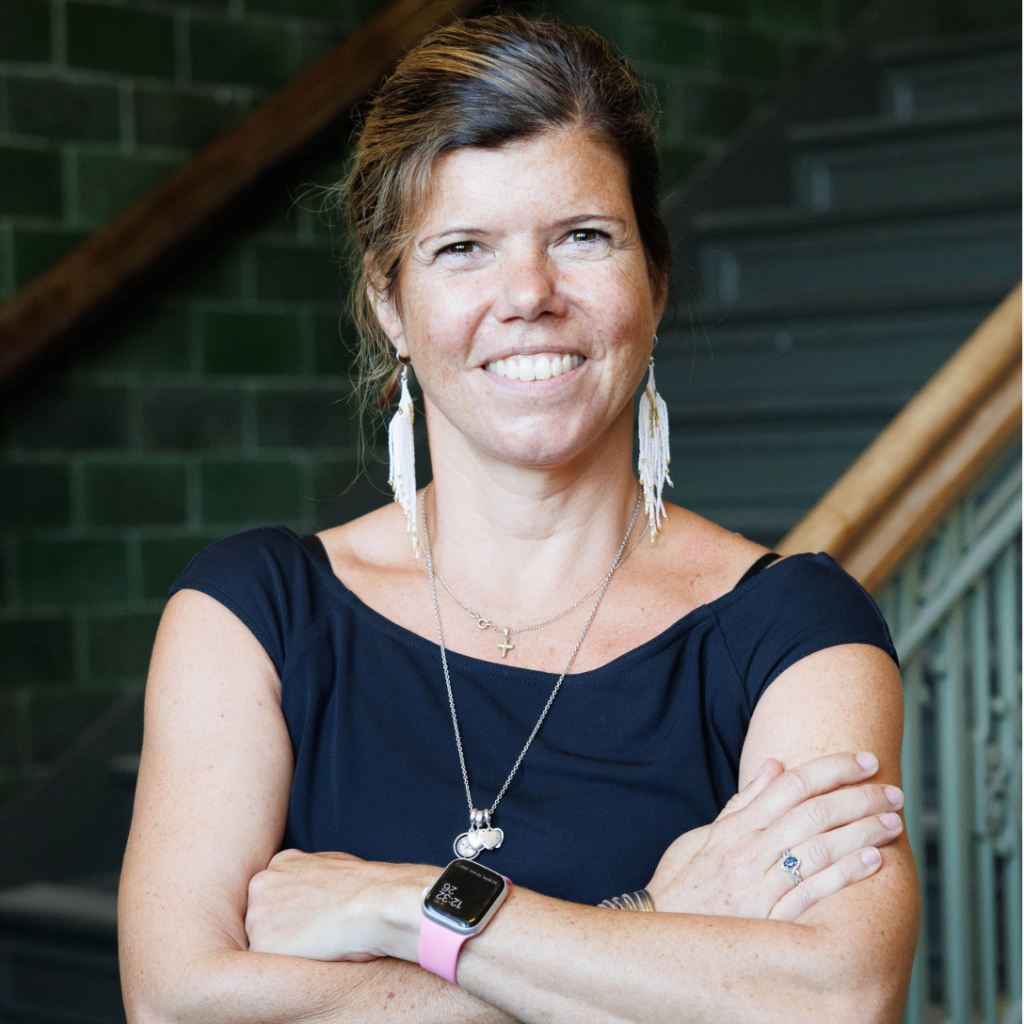 A photo of Annika Hinze with arms crossed